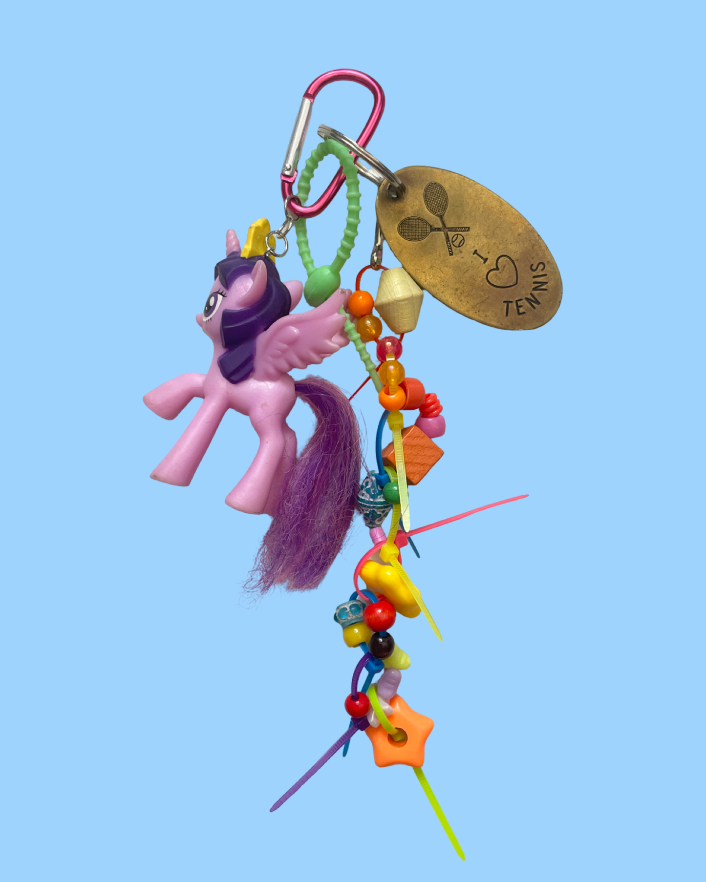 Bijou de sac poney violet