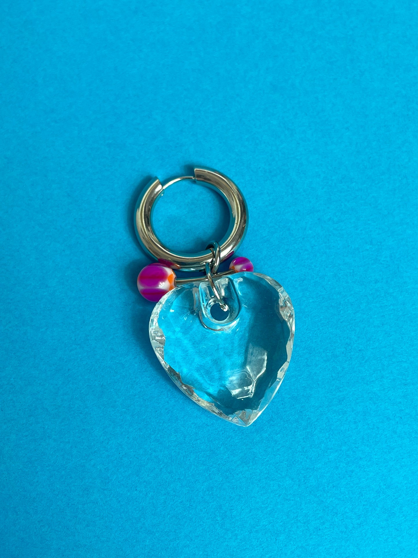 Boucle d'oreille coeur transparent