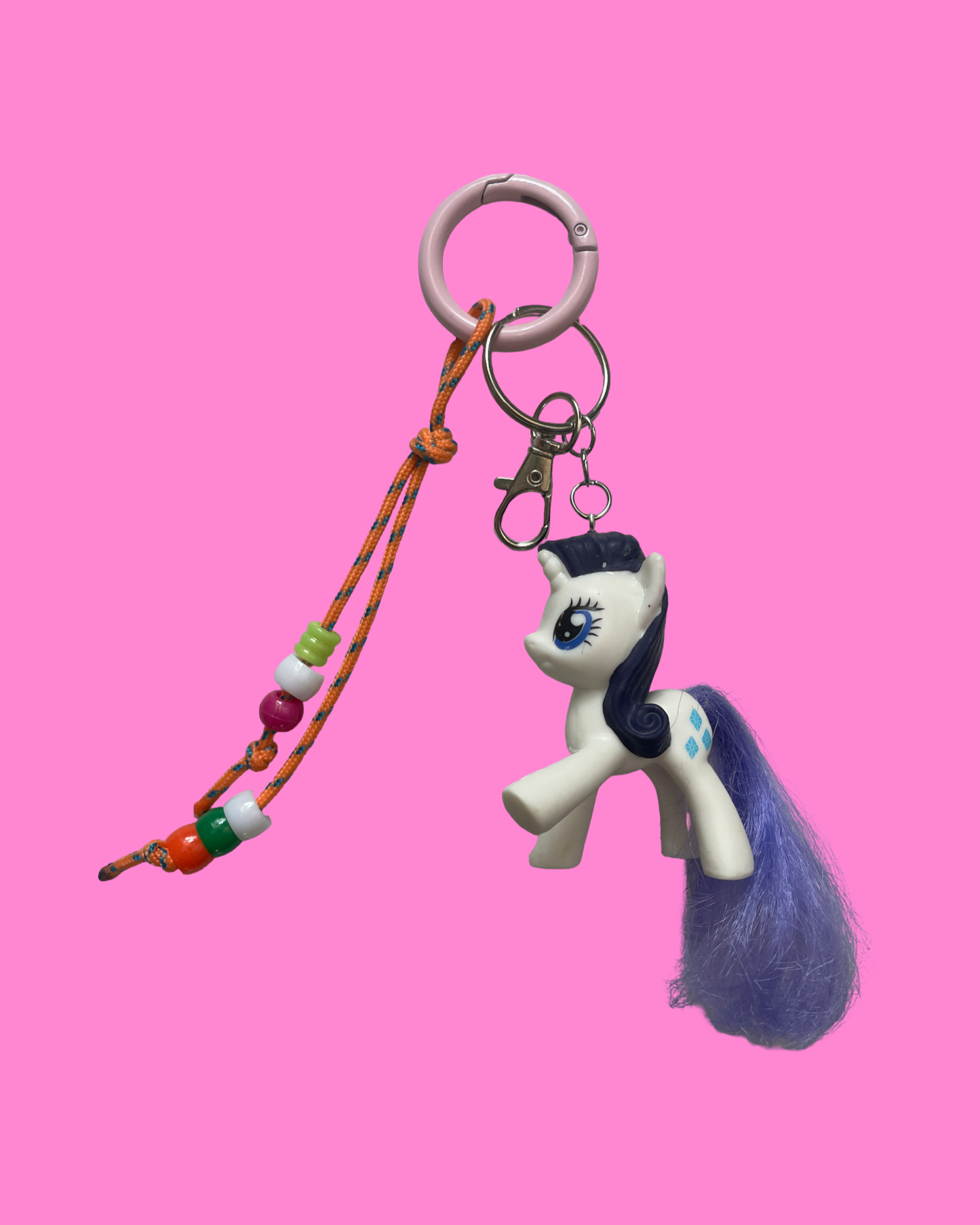 Bijou de sac poney blanc