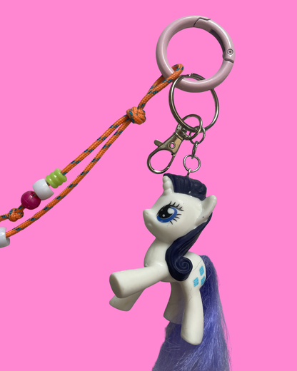 Bijou de sac poney blanc