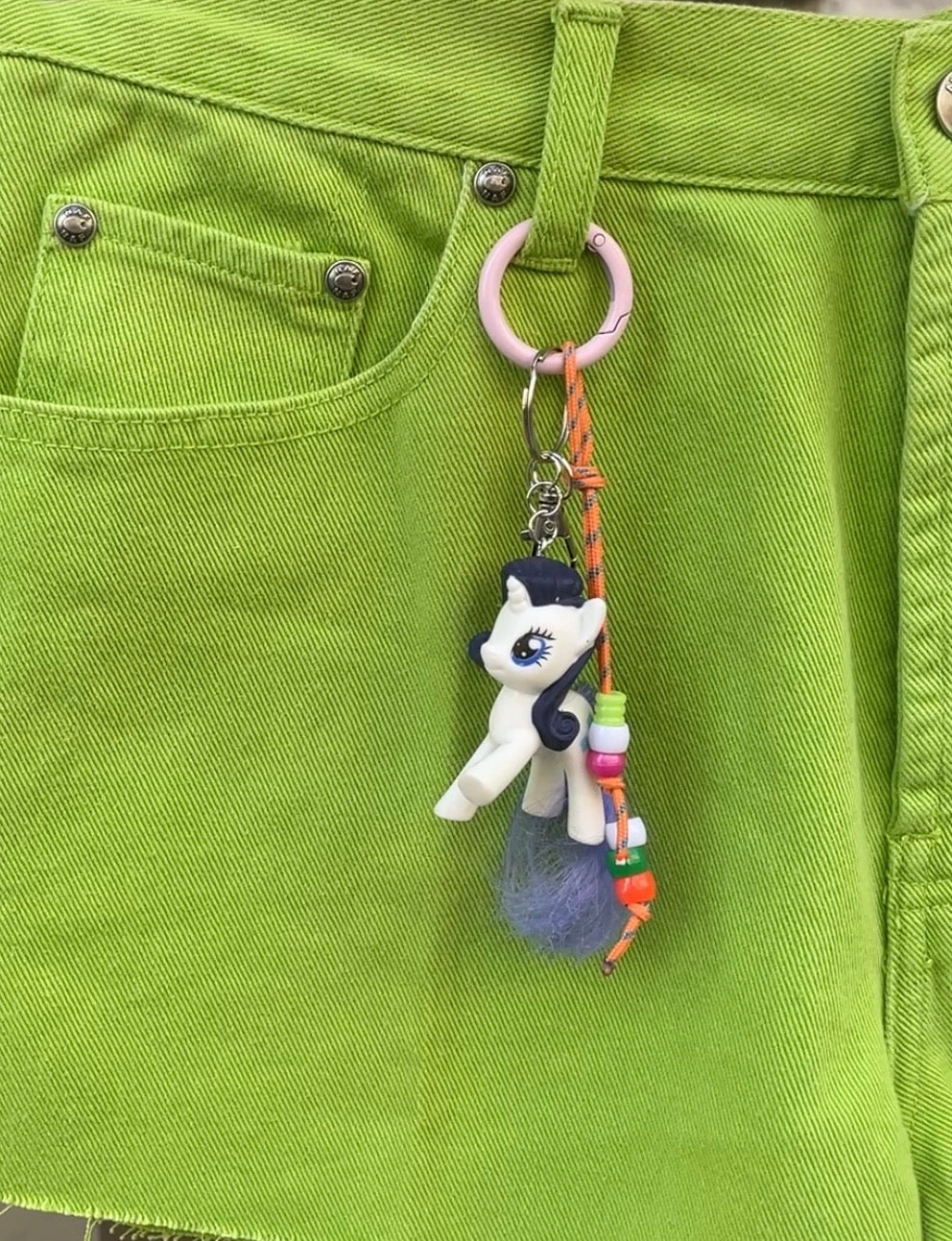 Bijou de sac poney blanc