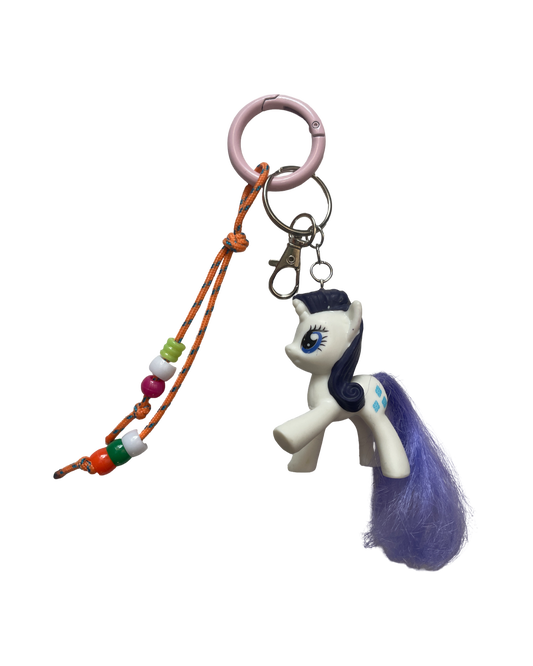 Bijou de sac poney blanc