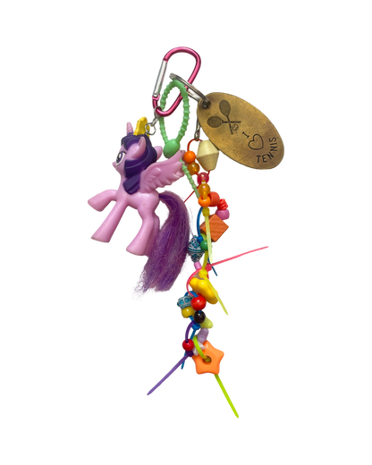 Bijou de sac poney violet