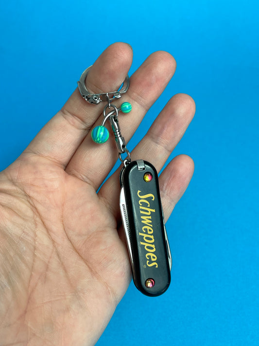 Porte-clés couteau Schweppes