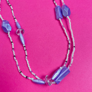 Sautoir violet en perles