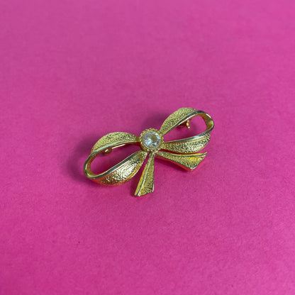 Broche noeud dorée