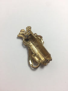 Broche dorée golf